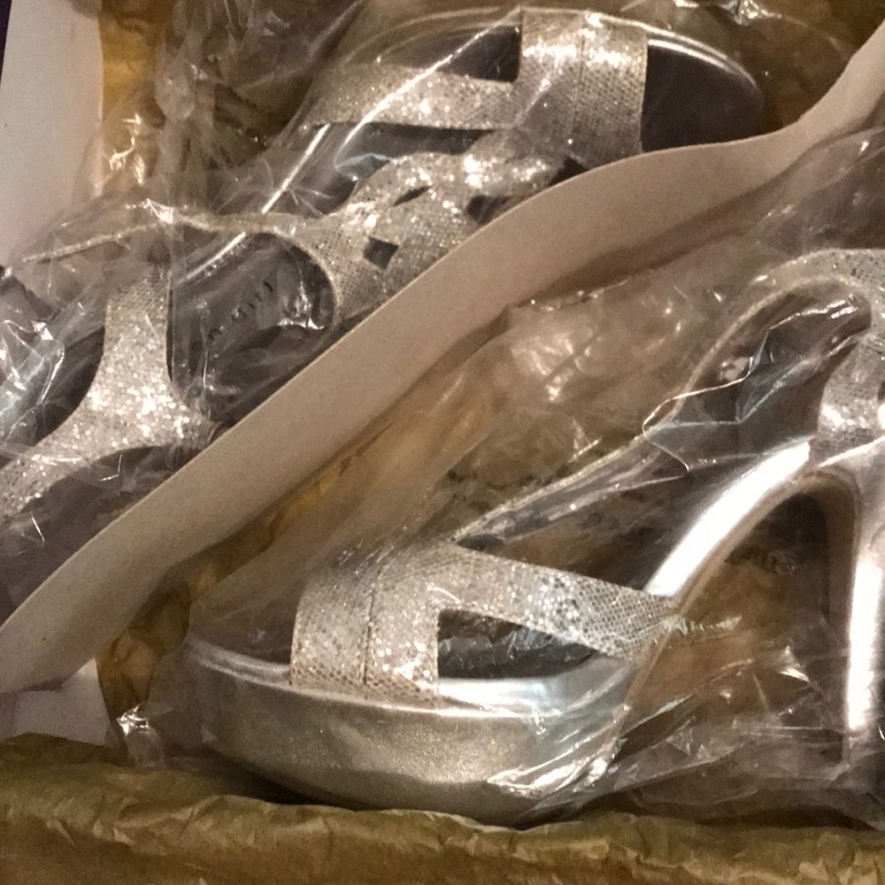 Madden Girl silver platforms!